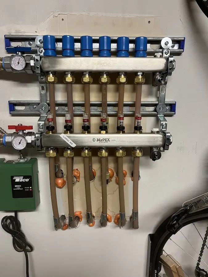 Plumber performing Water Heater Repair at a residential property in Totowa